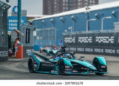 NEW YORK - JULY 11, 2021: Race Champion Sam Bird (10) Of Jaguar Racing Team Driving Formula E Car Leading 2021 ABB Formula E World Championship New York E-Prix Race 11 In Red Hook