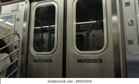 NEW YORK - JULY 14, 2014: MTA Subway Train Doors And Windows In New York. The NYC Subway Is A Rapid Transit/transportation System In The City Of NY.