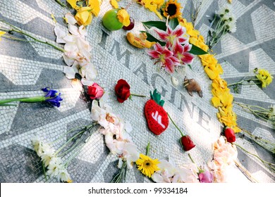 NEW YORK - JULY 17: John Lennon's Memorial At Central Park's Strawberry Fields On July 17, 2011 In New York. The Memorial Was Dedicated On What Would Have Been Lennon's 45th Birthday, 9 October 1985.