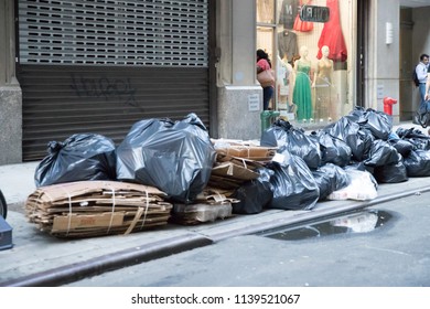 New York, July 19, 2018: Garbage Bags On The Sidewalk In New York City, USA