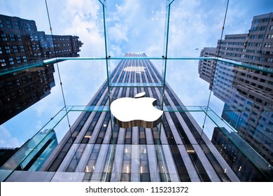 NEW YORK - JULY 21: Apple store on Fifth Avenue on July 21 2012 in New York City, USA. The store in it self is all underground except for the 32-foot glass cube right in front of f the GM building