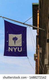 NEW YORK - JULY 22, 2017: NYU flag  in Lower Manhattan. New York University is a private research university based in New York City