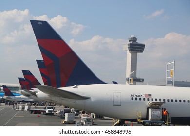 NEW YORK - JULY 6, 2016: Delta Airlines planes at the gate Terminal 4 at JFK International Airport in New York