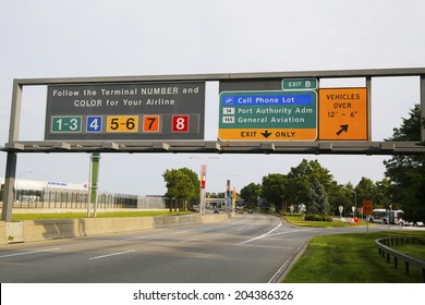 NEW YORK - JULY 8: Signs at the entrance to John F. Kennedy International Airport in New York on July 8, 2014. JFK is the busiest international air passenger gateway in the United States 