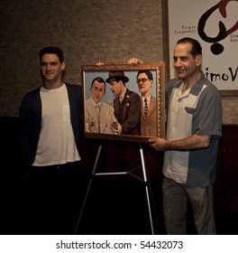 NEW YORK - JUNE 1: Tony Shalhoub And Justin Bartha Unveiling Painting To Honor Broadway Show Lend Me A Tenor At Tony's Di Napoli Restaurant In Manhattan On June 1, 2010 In New York City.