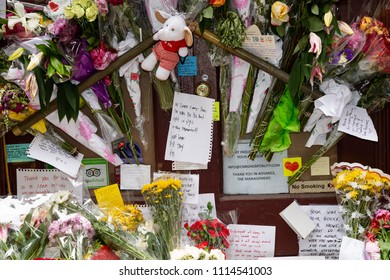 NEW YORK - JUNE 10:  Flowers and Photo Memorabilia are placed in Honor of The Death of Anthony Bourdain in Front of Les Halles Restaurant June 10, 2018 in New York City. (Photo by Donald Bowers )