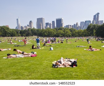 NEW YORK - JUNE 19: Central Park In The Summer Becomes A Very Popular Place For People To Take A Break From The Busy City On June 19, 2010 In New York, NY, USA.