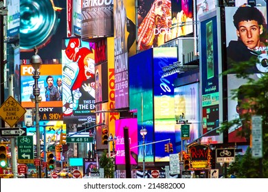 NEW YORK - JUNE 23:  Collage Of Neon Lights, Street Signs And Advertisements At Times Square In New York City On June 23, 2013.  Times Square Holds The Annual New Year's Eve Ball Drop.