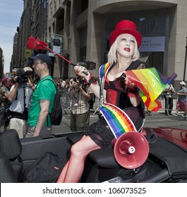 NEW YORK - JUNE 24: Grand Marshall Cyndi Lauper rides at 2012 New York City's Pride March in New York on June 24, 2012.