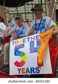 NEW YORK -  JUNE 26 : An Unidentified  Old Gay Couple Celebrates In A Gay Pride Parade After Passing The Same Sex Marriage Bill In New York City On June 26, 2011.