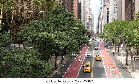 New York Manhattan Midtown architecture. Chrysler building, iconic high-rise skyscraper, 42 street, USA. American urban cityscape, NYC tower, United States. Avenue from Tudor City Bridge. Yellow taxi. - Powered by Shutterstock