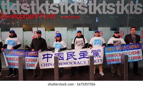 NEW YORK - MARCH 14, 2020: China's Democracy Party Demonstration At Times Square, Manhattan. The Democracy Party Of China Is A Political Party That Banned By The Communist Party Of China