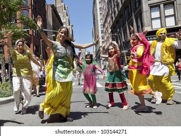 NEW YORK - MAY 19: Members of South Indian Bhangra dance group perform on Broadway as part of New York Dance Parade on May 19, 2012 in New York City