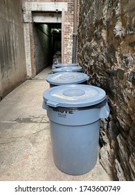 New York, New York - May 2020: Resident Takes Picture Of Trash Bins In Coop Apartment