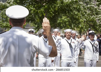 NEW YORK - MAY 22 2015: Admiral Phil Davidson, Commander, US Fleet Forces Command, Swears In Personnel During The Re-enlistment And Promotion Ceremony At The National September 11 Memorial Site.