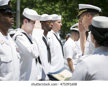 NEW YORK MAY 27 2016: US Navy Personnel Salute Admiral Phil Davidson, Commander, US Fleet Forces Command, During The Re-enlistment And Promotion Ceremony At The National September 11 Memorial Site.