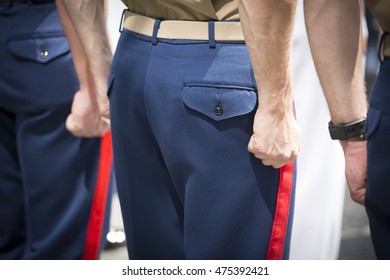 NEW YORK MAY 27 2016: Clenched Fists Of US Marine Corpsman Standing At Attention During The Re-enlistment And Promotion Ceremony At The National September 11 Memorial Site During Fleet Week 2016.