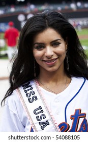 NEW YORK - MAY 27:  Miss USA, Rima Fakih, Wearing A Jersey At The Mets Vs. Phillies Baseball Game At Citi Field Park Stadium In New York On May 27, 2010.