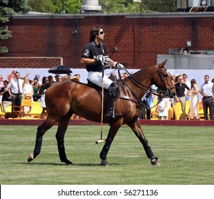 NEW YORK - MAY 30: Argentine polo player Nachos Figueras competes in the Veuve Clicquot Manhattan Polo Classic at Governors Island on May 30, 2009 in New York City.