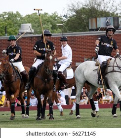NEW YORK - MAY 30: HRH Prince Harry and Argentine player Nachos Figueras compete in the Veuve Clicquot Manhattan Polo Classic at Governors Island on May 30, 2009 in New York City.