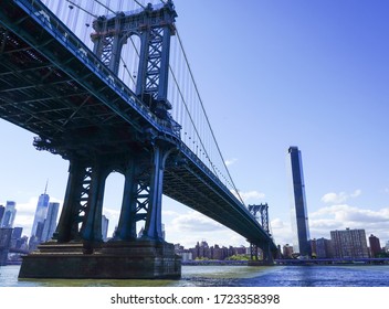 NEW YORK - MAY 4, 2020: Famous Manhattan Bridge.The Manhattan Bridge is a suspension bridge that crosses the East River, it was opened on December 31, 1909 and was designed by Leon Moisseiff 