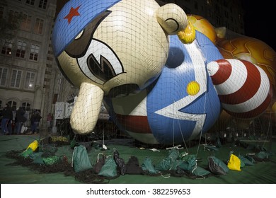 NEW YORK - NOV 25 2015: Arrtle The Pirate Balloon Tied Down With Sandbags And Netting During Macy's Giant Balloon Inflation Event Held The Day Before Thanksgiving In Manhattan.