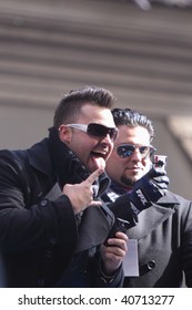 NEW YORK - NOVEMBER 6: Nick Swisher Showing His Signature Pose To Yankee Fans During The Ticket-tape Parade On November 6, 2009 In New York, NY.