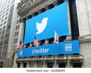 NEW YORK - NOVEMBER 7: The Twitter Logo Is Shown In Front Of The NYSE On November 7, 2013 In New York. Twitter, Ticker Symbol: TWTR, Went Public Today At $26 Per Share.