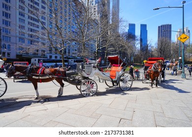 NEW YORK, NY -22 MAR 2022- View Of A Horse Drawn Carriage, A Popular Tourist Attraction Around Central Park In Manhattan, New York.