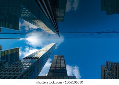 New York, NY - 9-29-2017: 432 And 450 Park Avenue Are Reflected Creatively Off The Glass Facade Of 430 Park Avenue.