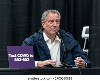 New York, NY - April 10, 2020: Mayor Bill De Blasio briefs media during visit to temporary hospital located at indoor courts of  USTA Billie Jean King National Tennis Ceâ€‹nter