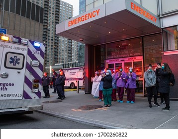 New York, NY - April 10, 2020: Nurses, doctors and medical staff of NYU Langone hospital were cheered up amid COVID-19 pandemic in Manhattan