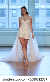 NEW YORK, NY - APRIL 13: A Model Walks The Runway For The Justin Alexander Spring 2019  Bridal Fashion Show On April 13, 2018 In New York City. 