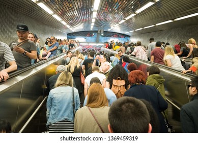 New York, NY - April 13 2019: Crowds Of People Wait In A Crowded Subway In Roosevelt Island To Go See The Cherry Blossom Festival. It Is Packed With People And It Is Hard To Get Into The Island 