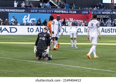 New York, NY - April 25, 2022: Goalkeeper Alex Bono (25) of Toronto FC reacts after allowing goal during MLS regular season 2022 game at Citi Field against NYCFC. NYCFC won 5 - 4.
