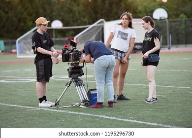 New York, NY; Aug 2018: A Film Crew Shoots A Scene On A Football Field