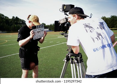 New York, NY; Aug 2018: A Film Crew Shoots A Scene On A Football Field