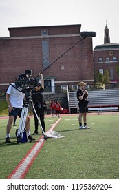 New York, NY; Aug 2018: A Film Crew Shoots A Scene On A Football Field