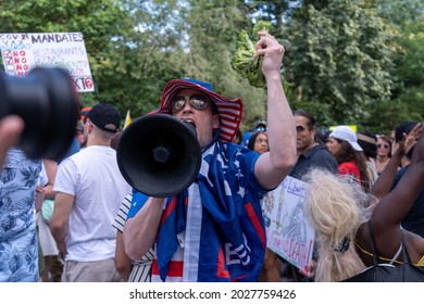 NEW YORK, NY - AUGUST 15, 2021: Counter Protesters Interrupt A Republicans Rally Against COVID Vaccine Mandates Outside Of Gracie Mansion.