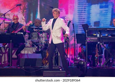 NEW YORK, NY - AUGUST 21: Barry Manilow Performs During 