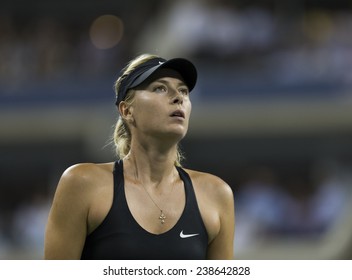NEW YORK, NY - AUGUST 25: Maria Sharapova of Russia reacts during 1st round match against Maria Kirilenko of Russia at US Open tennis tournament in Flushing Meadows USTA Tennis Center 2014