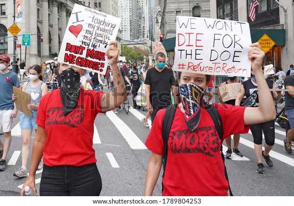 NEW YORK, NY – AUGUST 3, 2020: BLM, UFT and other
groups participate in a National Day of Resistance to protest for
demands including no reopening of schools, police-free schools, and
federal funds.