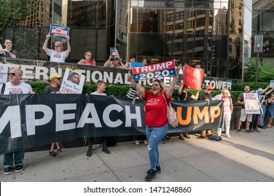 New York, NY - August 5, 2019: Members of Rise and Resist action group staged rally to support impeachment of President Trump  & lonely Trump supporter against them in front of Trump Hotel and Tower