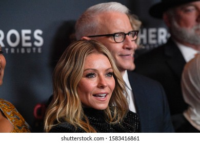 NEW YORK, NY - DECEMBER 08: Kelly Ripa and Anderson Cooper attend the 13th Annual CNN Heroes at the American Museum of Natural History on December 08, 2019 in New York City.