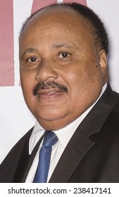 NEW YORK, NY - DECEMBER 14, 2014: Martin Luther King III (R) Attends The 'Selma' New York Premiere At The Ziegfeld Theater