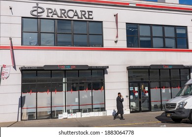 NEW YORK, NY – DECEMBER 27: A Man Walks By The ParCare Community Health Network Williamsburg Office On December 27, 2020 In Brooklyn Borough Of New York City.