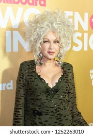New York, NY - December 6, 2018: Cyndi Lauper wearing dress by  Fleur Du Mal attends Billboard's 13th Annual Women in Music gala at Pier 36