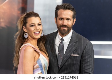 New York, NY - February 28, 2022: Blake Lively wearing dress by Versace and Ryan Reynolds attend The Adam Project by Netflix premiere at Alice Tully Hall