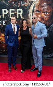 New York, NY - July 10, 2018: Rawson Marshall Thurber, Dany Garcia and Dwayne Johnson attend the premiere of Skyscraper at AMC Loews Lincoln Center