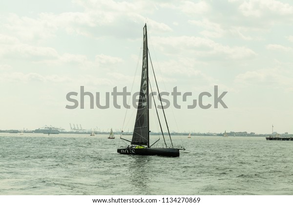 New York, NY - July 14, 2018: Formula E car race
round 11 for NYC ePrix sponsor Hugo Boss yacht sails in New York
harbor at Red Hook